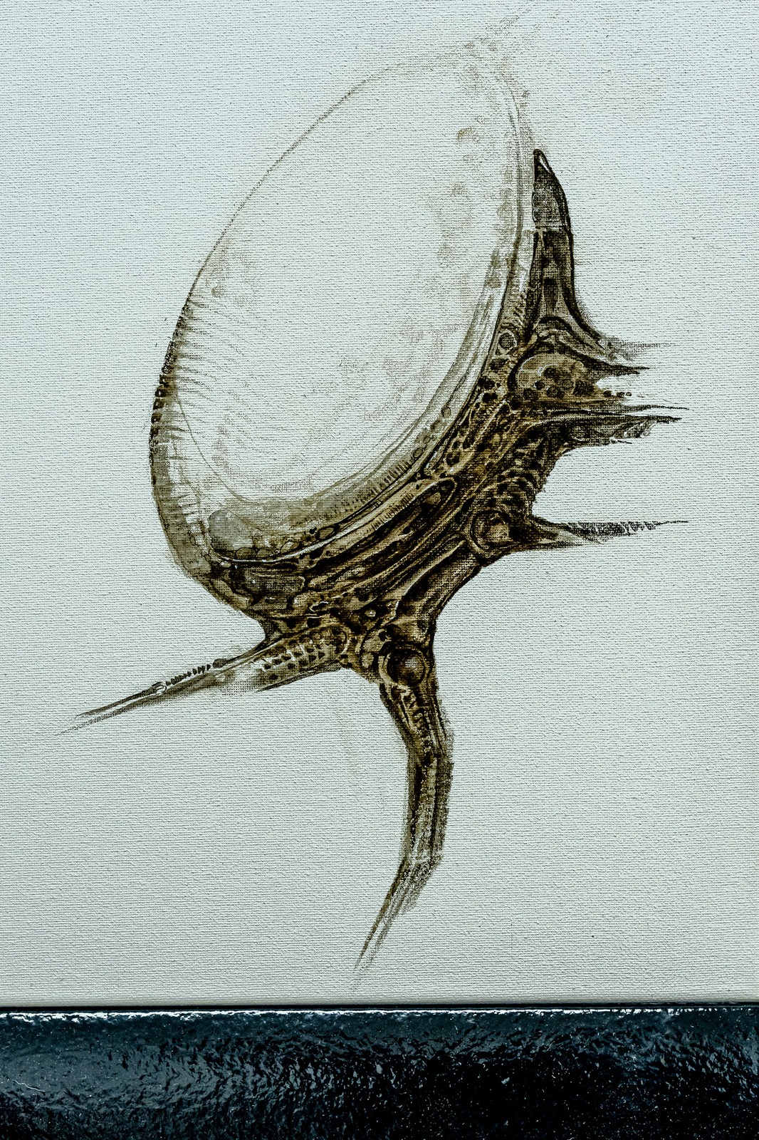 An abstract painting of a dark, organic-looking form on a white canvas.